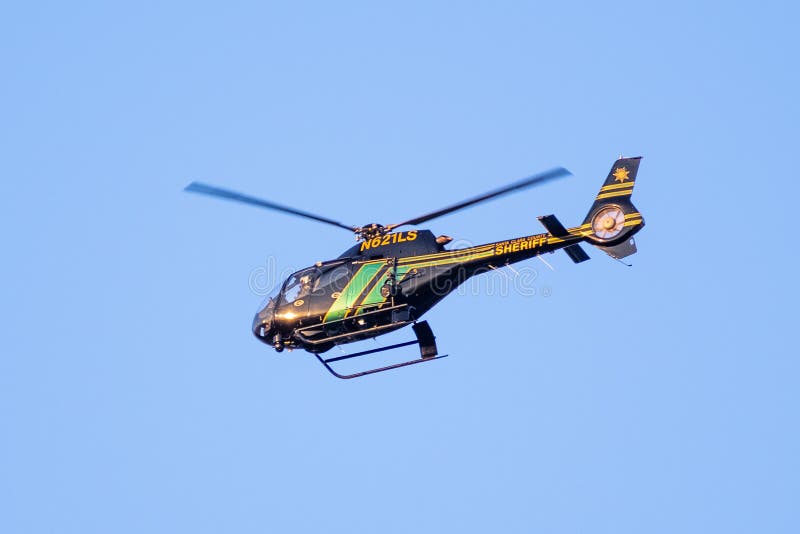 September 4, 2020 Sunnyvale / CA / USA - Santa Clara County Sheriff helicopter in mid flight. September 4, 2020 Sunnyvale / CA / USA - Santa Clara County Sheriff helicopter in mid flight