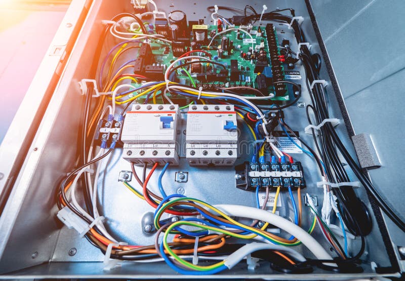 Open Air Conditioner Unit with Wires, Pipes and Electrical Equipment