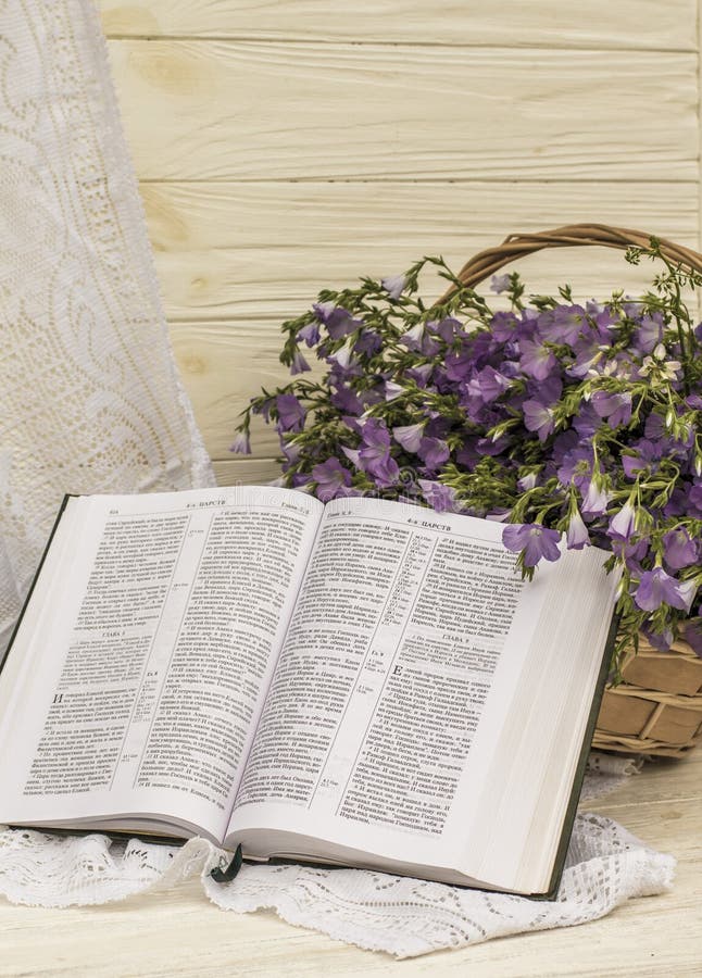 Open Bible and Bouquet Flax in Wicker Basket. Retro Style Stock Image ...