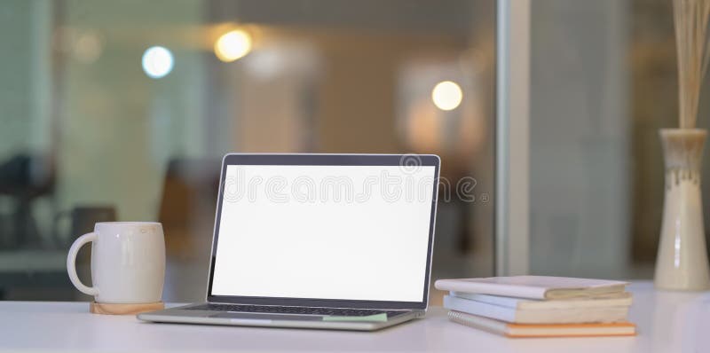 Open blank screen laptop computer in modern home-office stock images