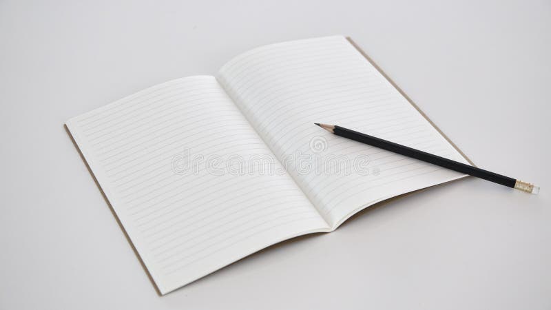 Opened notebook / sketchbook with one blank page paper and pencil - a  Royalty Free Stock Photo from Photocase