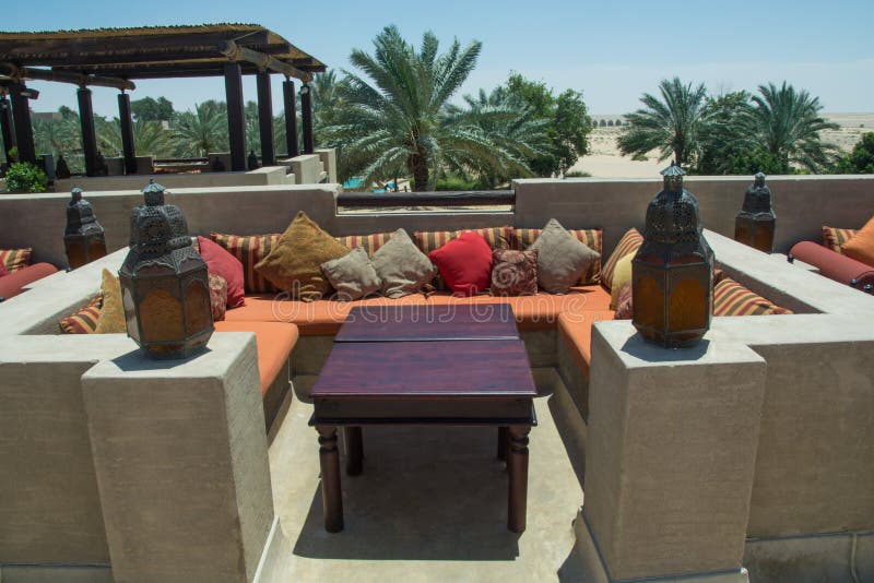 Open Comfortable Restaurant Lounge with Lighters, Tables, Sofas and