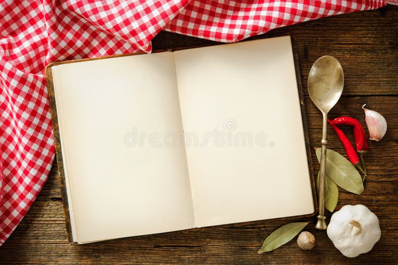 Open cookbook with kitchenware on checkered tablecloth. Vintage rustic recipe book background stock images, royalty-free photos and pictures