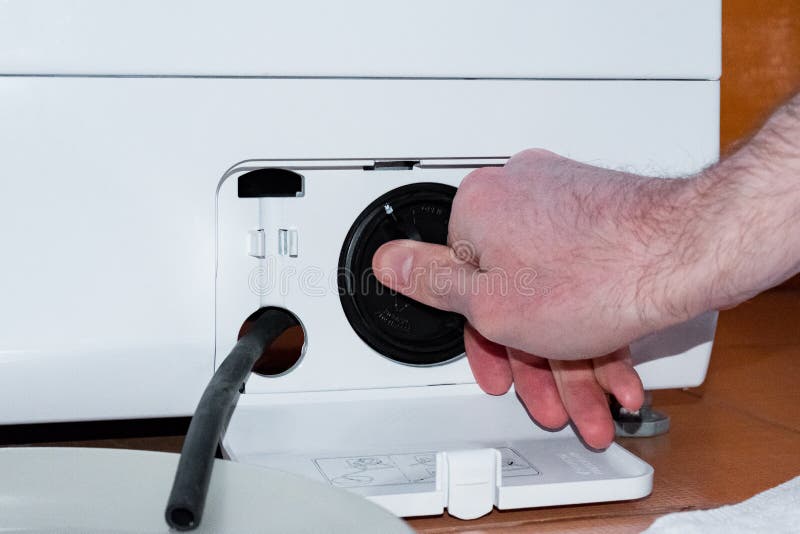 Open Cover of Washing Machine Filter. Repair Work of the Washing