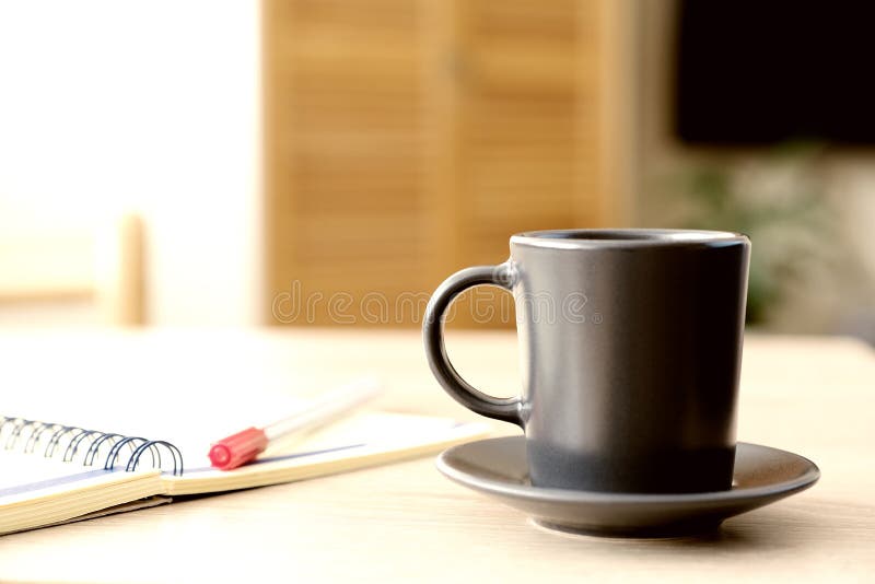 Open the diary a planner, a pencil and glasses on the table closeup. stock image