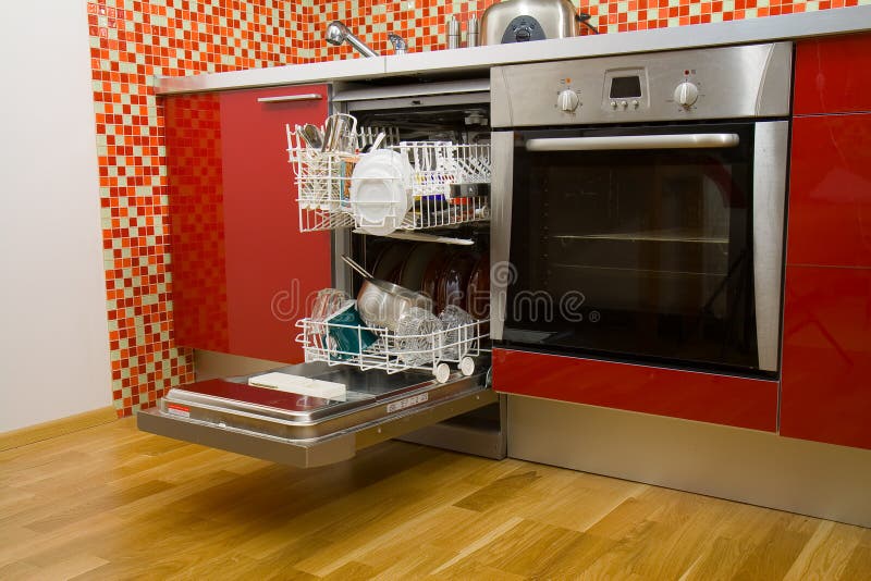Open dishwasher with clean dishes stock photo