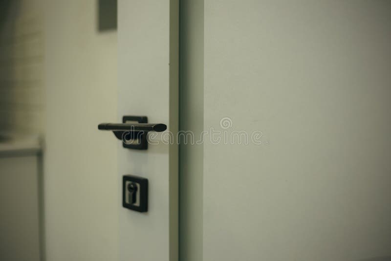 Open door in the office stock photo. Image of white 262473106