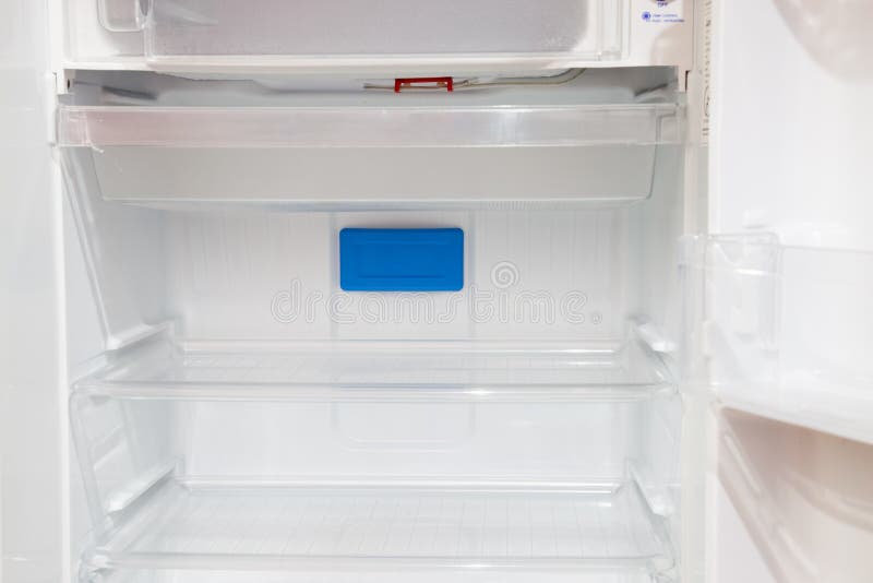 Open empty refrigerator royalty free stock image.