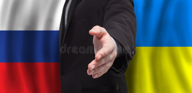 Open hand on flags of Ukraine and Russia background. Peace talks concept.