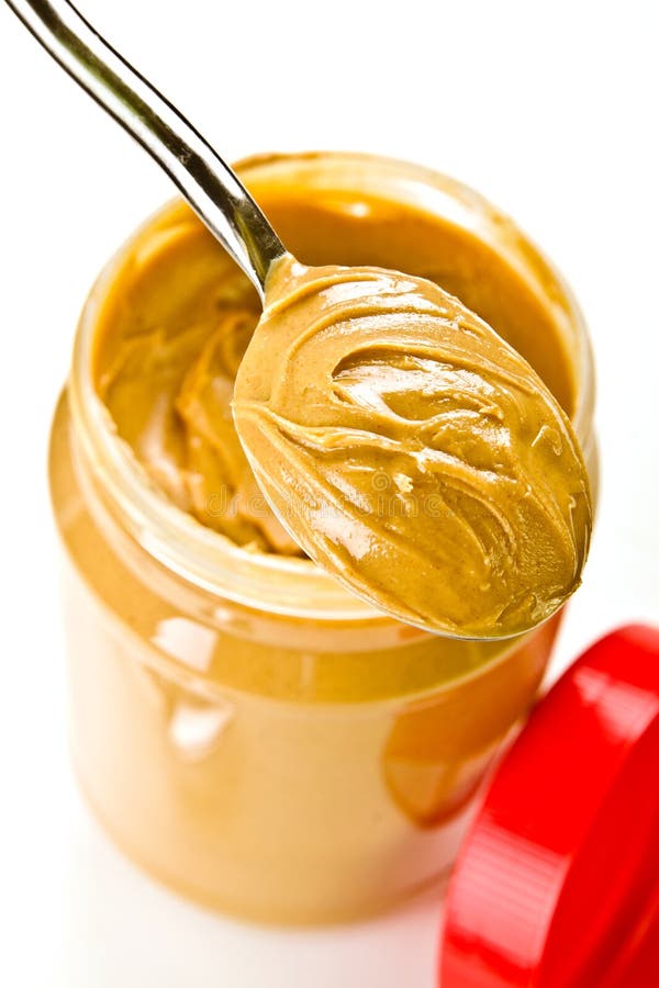 An Open Jar Of Peanut Butter With Spoon Stock Photo, Picture and Royalty  Free Image. Image 13094043.