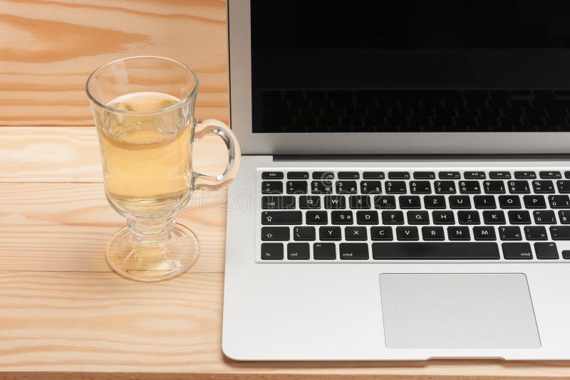 Open Laptop with Cup of Tea on Wooden Background Stock Photo Image of