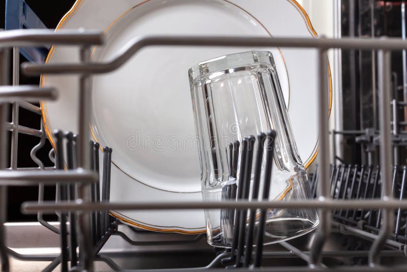 Open Modern Dishwasher with a Clean Washed Glass and White Plate Stock Photo Image of