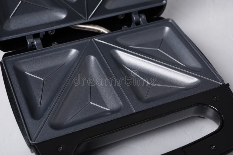 Open Modern Sandwich Maker on Light Grey Table, Closeup Stock Image