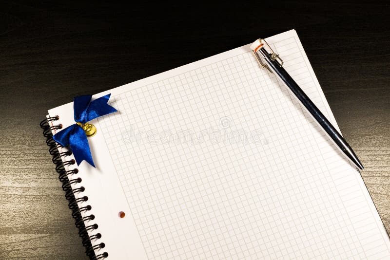Open notebook with blank pages and pencil on black wooden background royalty free stock photos Open notebook with blank pages and pencil on black wooden background royalty free stock photos