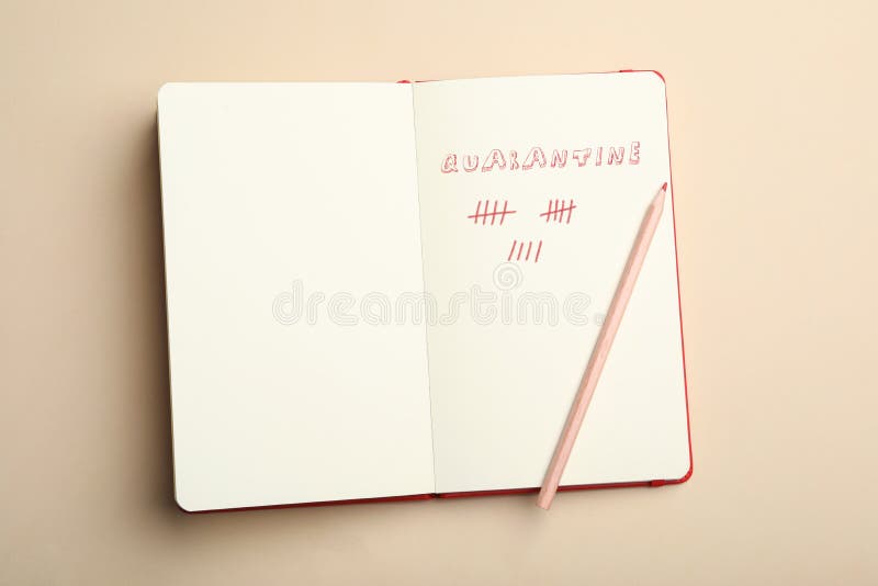 Open notebook and pencil on background, top view. Counting days of quarantine during coronavirus outbreak royalty free stock images