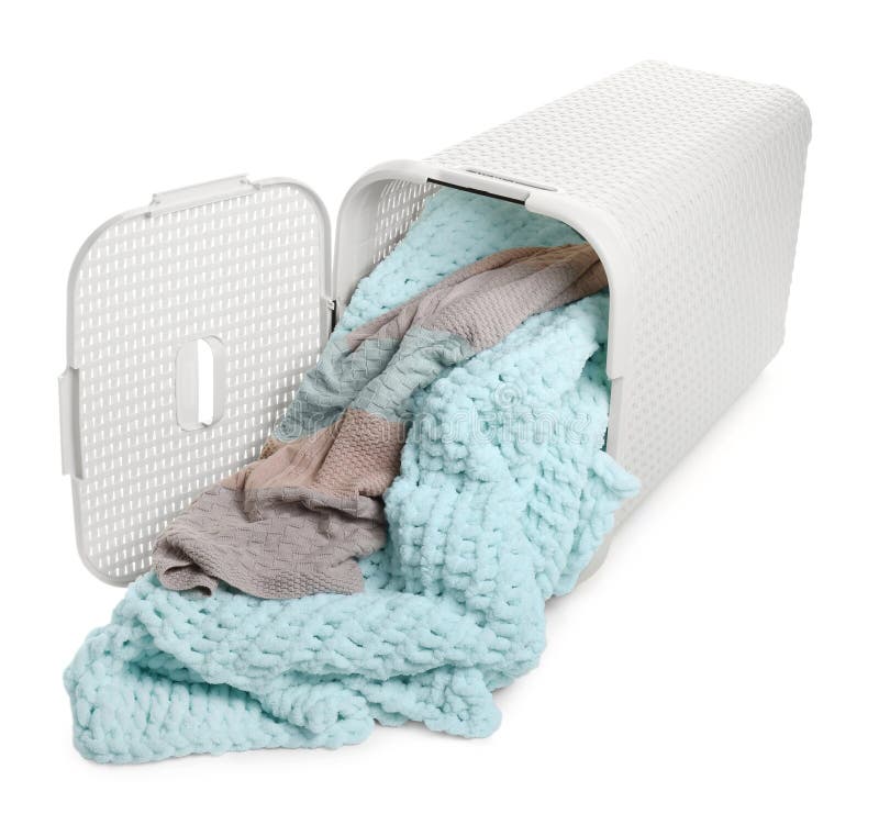 Overturned Laundry Basket Full of Clothes Isolated on White Stock Photo
