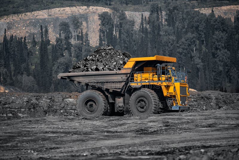 Open pit mine industry, big yellow mining truck for coal anthracite