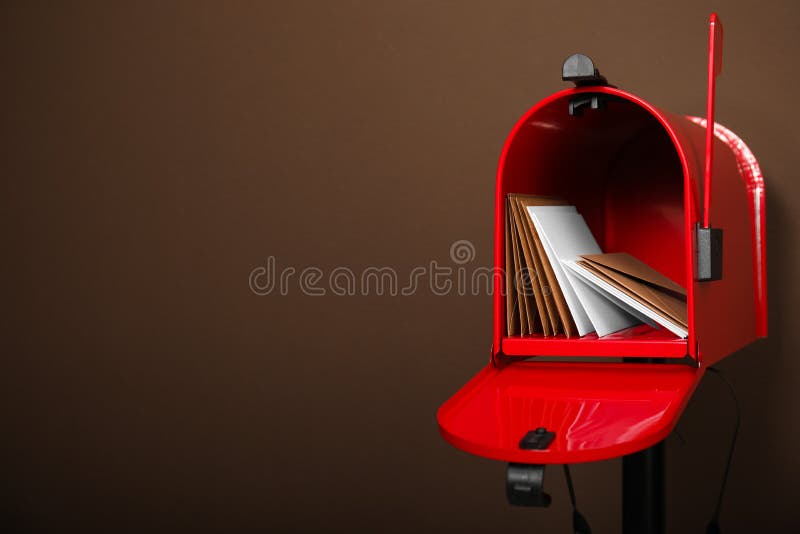 Open Red Letter Box with Envelopes Against Wooden Background. Space for