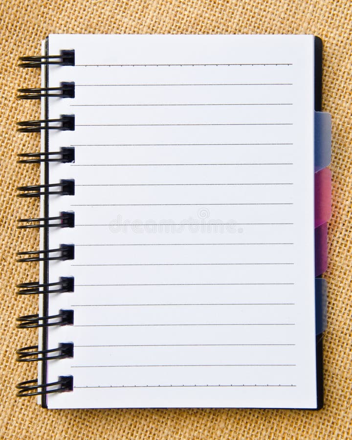 Open diary ring binder on sack background. Open diary ring binder on sack background.