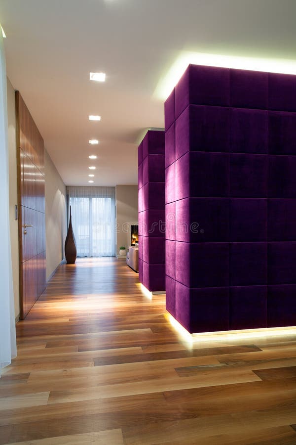 Open space interior with purple wall