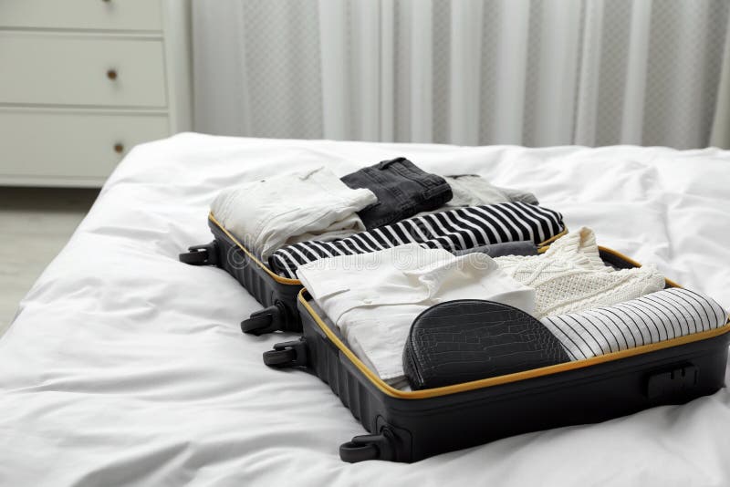 Open Suitcase with Clothes on Bed Indoors Stock Photo Image of