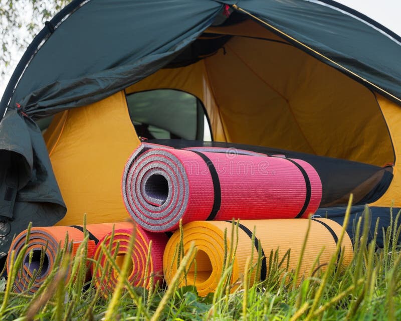 Open Tent and Rolled Sleeping Pads Stock Photo Image of discovery