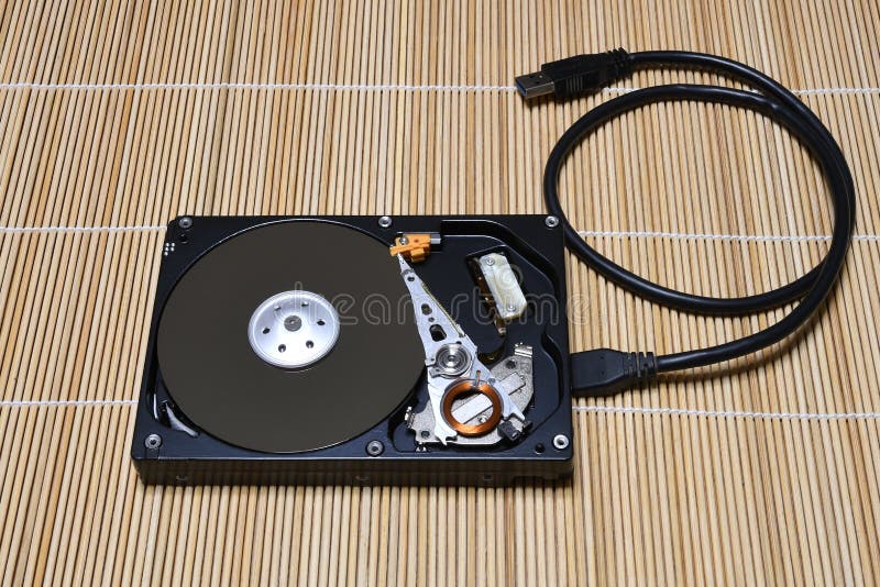 Open USB Hard Disk Drive on wood background stock photography