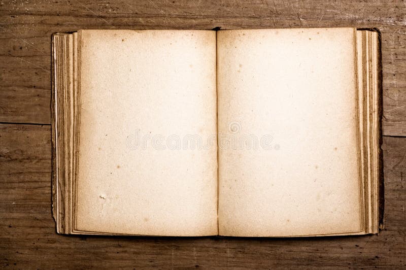 Old book open isolated. Used paper texture Stock Photo