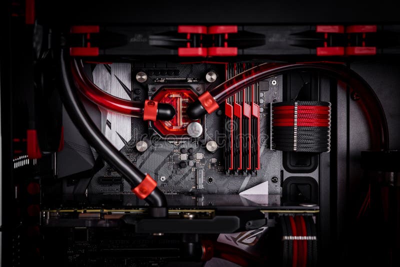 Open your computer with a water cooling system, a processor, a graphics card, a motherboard fan. Game console behind a white background stock images Open your computer with a water cooling system, a processor, a graphics card, a motherboard fan. Game console behind a white background stock images