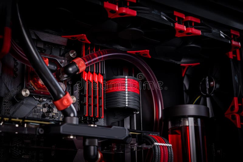 Open your computer with a water cooling system, a processor, a graphics card, a motherboard fan. Game console behind a white background royalty free stock photos Open your computer with a water cooling system, a processor, a graphics card, a motherboard fan. Game console behind a white background royalty free stock photos