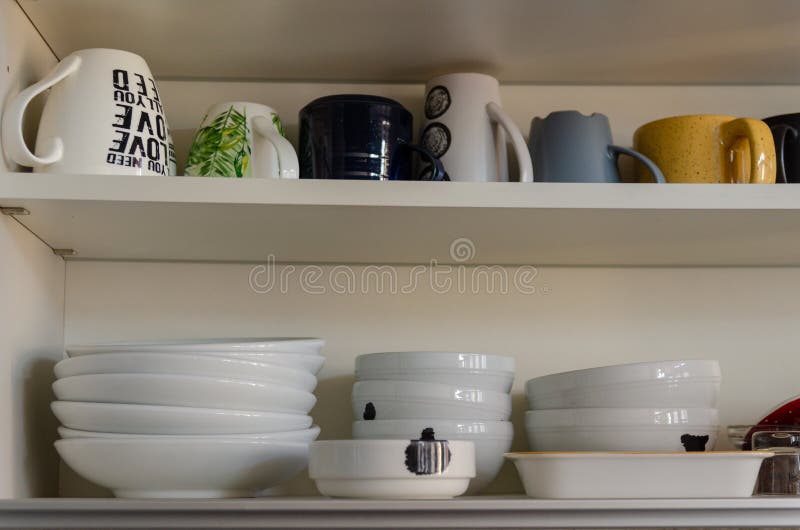 Opened Kitchen with Storage Plates Inside, Mugs, Bowls and Cups Stock Image Image of