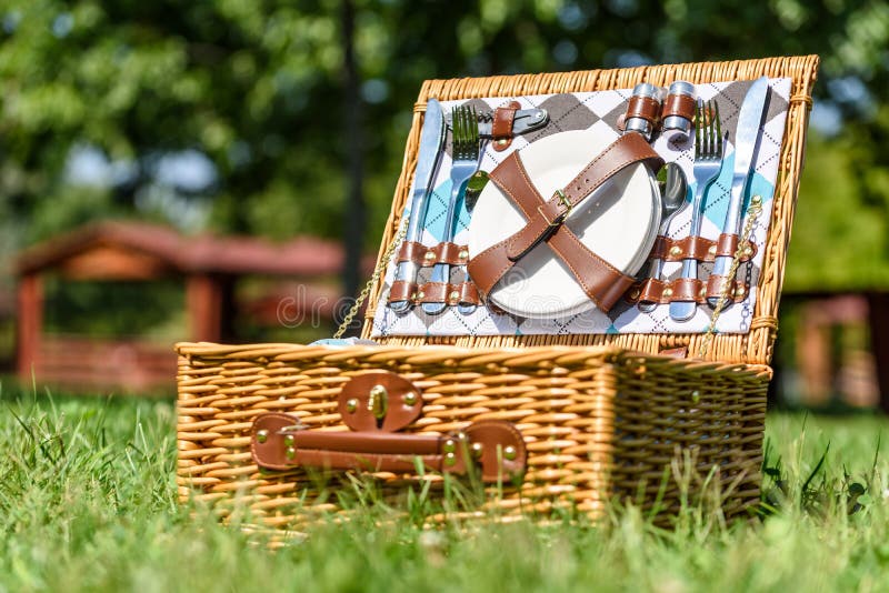 Opened Picnic Basket with Cutlery in Green Grass Stock Image Image of