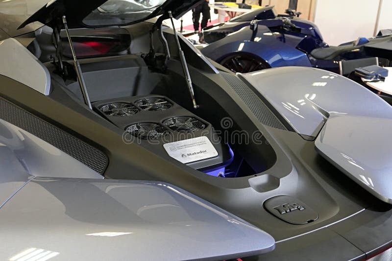 Opened rear part of concept supersport car MH2 with visible cooling fans and hydrogen fuel cells.