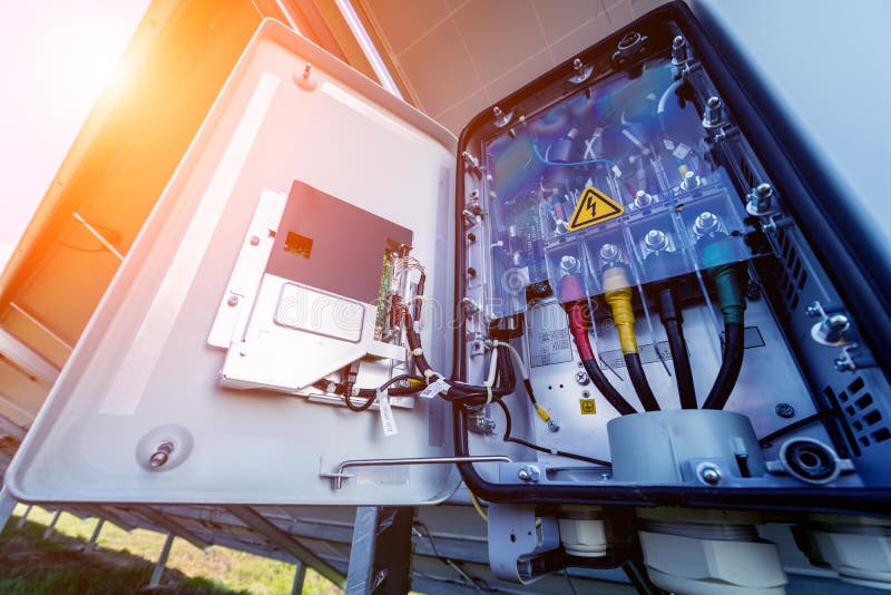 Opened voltage inverter at the back side of solar panel.