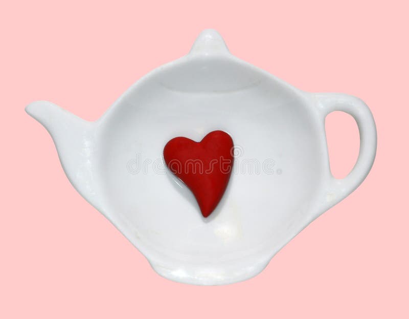 Opened white saucer cup of tea, red heart inside, isolated background, flat lay, top view. Copy space. Love coffee or tea concept stock images Opened white saucer cup of tea, red heart inside, isolated background, flat lay, top view. Copy space. Love coffee or tea concept stock images