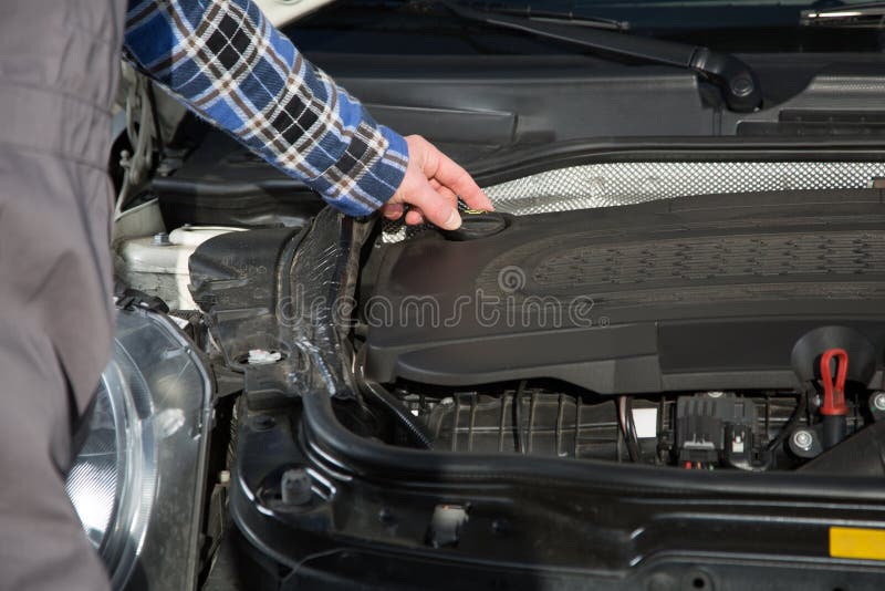 Opening a car oil cap stock photo. Image of routine, vehicle 52650022