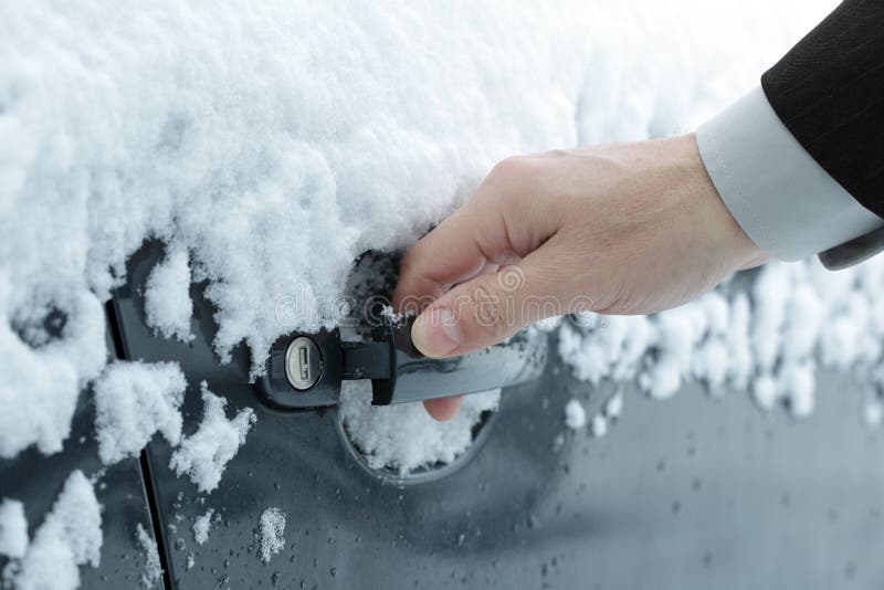 Opening a frozen car door stock photo. Image of hand 12450534