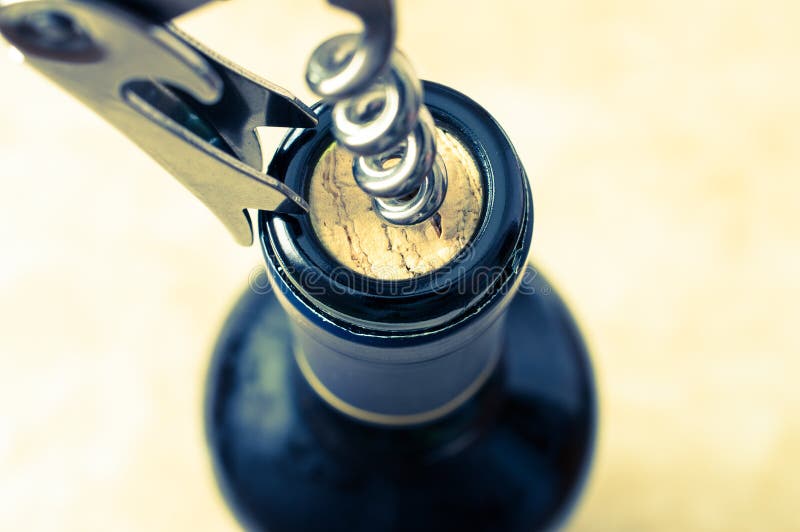 Opening a wine bottle stock photos Opening a wine bottle stock photos