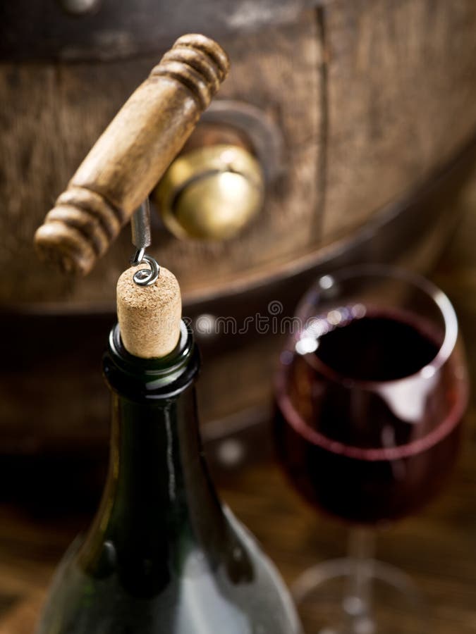 Opening of a Wine Bottle with Corkscrew. Stock Photo Image of