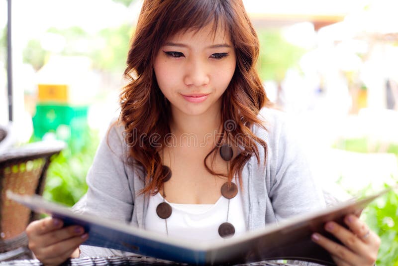 She opens the menu items.