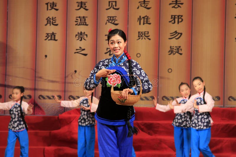 LUANNAN - MAY 13: Pingju opera Liu Qiaoer. stills on the stage on May 13, 2013, Luannan County, Hebei Province, china. LUANNAN - MAY 13: Pingju opera Liu Qiaoer. stills on the stage on May 13, 2013, Luannan County, Hebei Province, china.