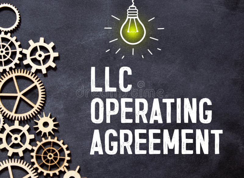 Operating agreement text on notebook page on wooden background. notepad on a black calculator. text on the page