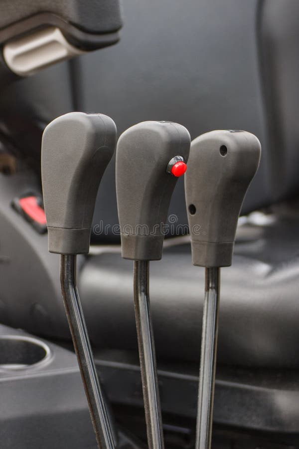Operating Control Levers with Buttons in Forklift or Other Industrial Machine. Transportation