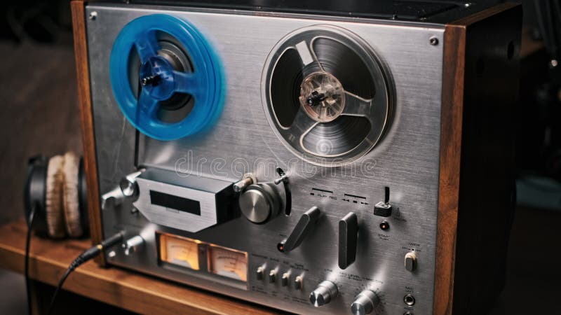 Operating vintage reel-to-reel tape recorder stock video