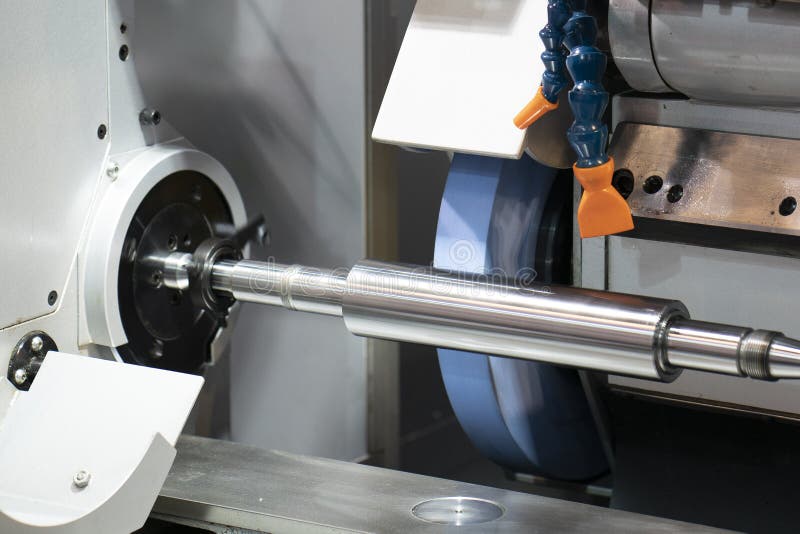 Operator grinding forging die parts stock photography