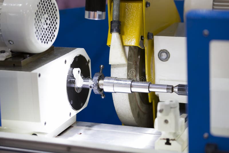 Operator grinding forging die parts royalty free stock images