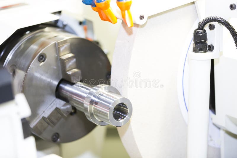 Operator grinding mold and die part by universal grining machine