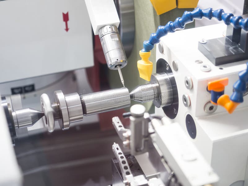 Operator grinding mold and die part royalty free stock photos
