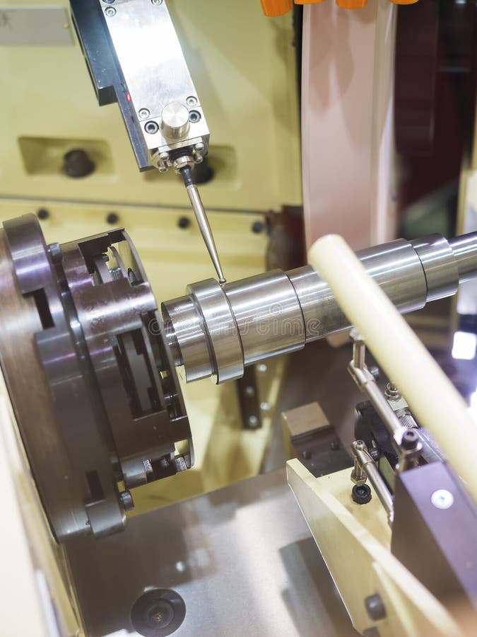 Operator grinding mold and die part stock photos