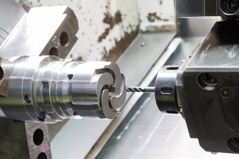 Operator Machining Mold and Die Part by CNC Turning Machine in F Stock